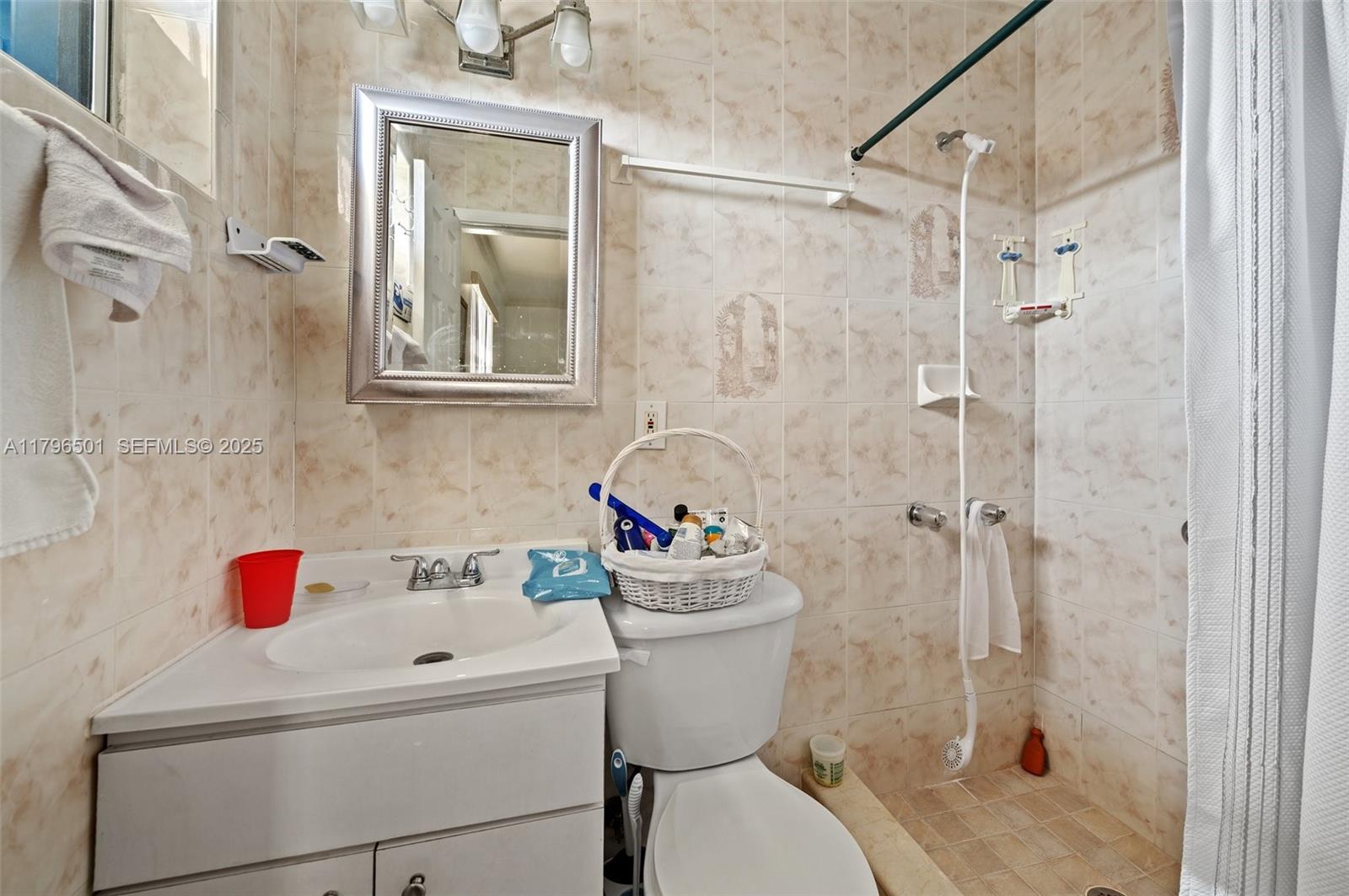 Hialeah Acres Hialeah, FL 33010 - Photo 46 of 55 a bathroom with a shower and a sink