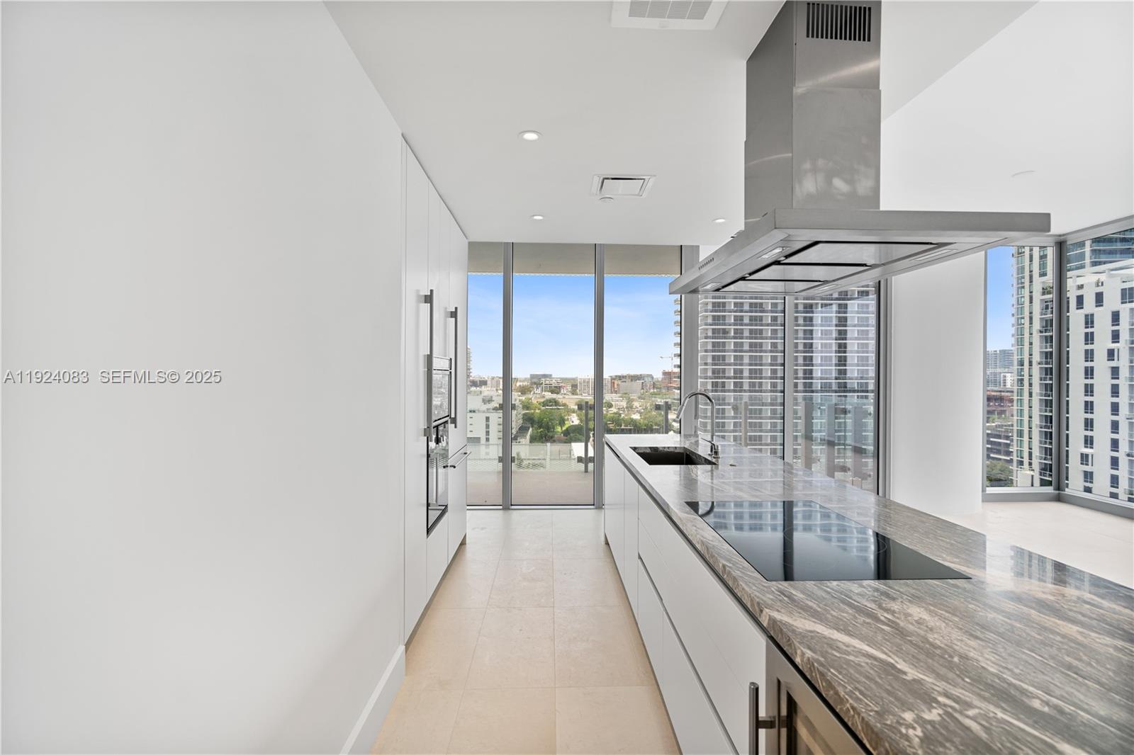 700 Northeast 26th Terrace, Unit 1406 Miami, FL 33137 - Photo 30 of 41 a balcony with view of living room
