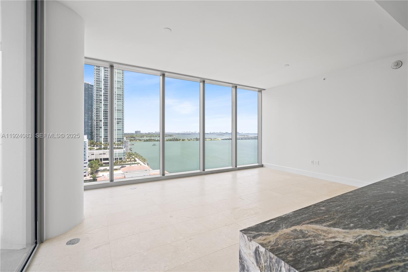 700 Northeast 26th Terrace, Unit 1406 Miami, FL 33137 - Photo 6 of 41 a view of an empty room and window
