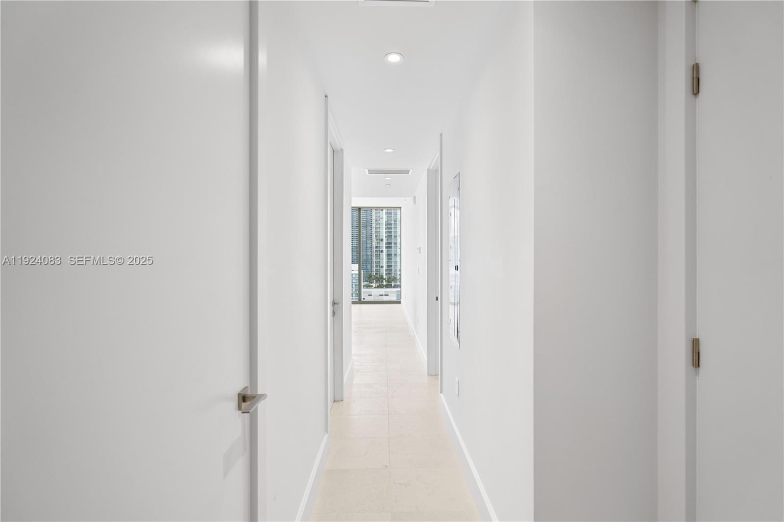 700 Northeast 26th Terrace, Unit 1406 Miami, FL 33137 - Photo 7 of 41 a view of a hallway with closet