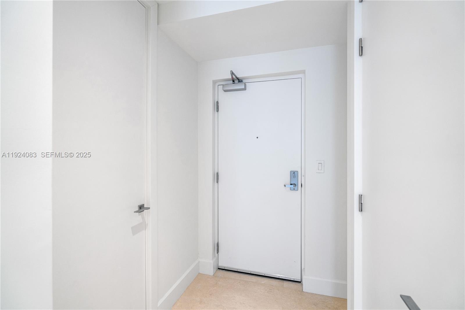 700 Northeast 26th Terrace, Unit 1406 Miami, FL 33137 - Photo 8 of 41 a view of a closet