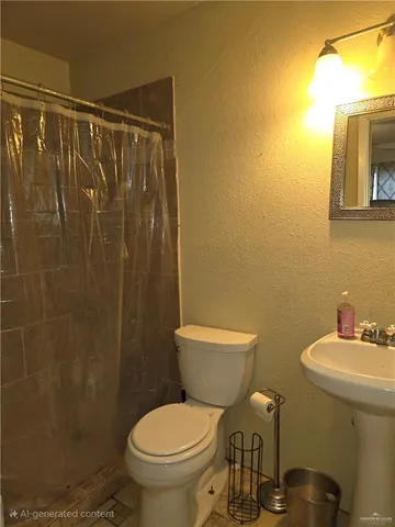 a bathroom with a toilet a sink and shower