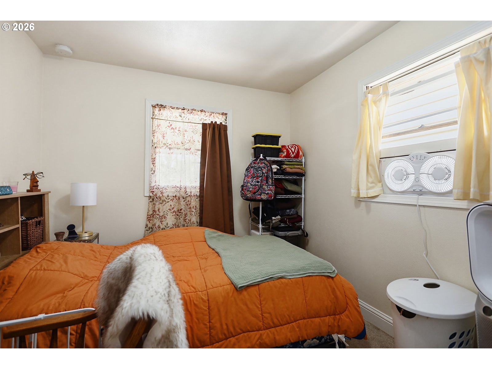 1214 Walnut Street The Dalles, OR 97058 - Photo 15 of 29 a bedroom with a bed and dresser
