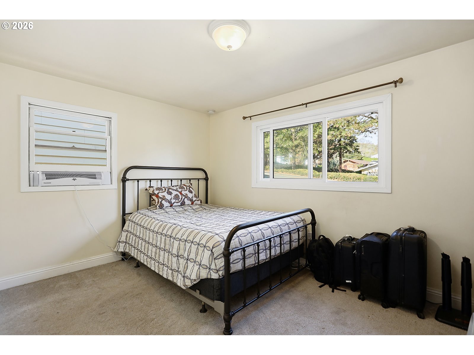 1214 Walnut Street The Dalles, OR 97058 - Photo 19 of 29 a bedroom with a bed window and dresser