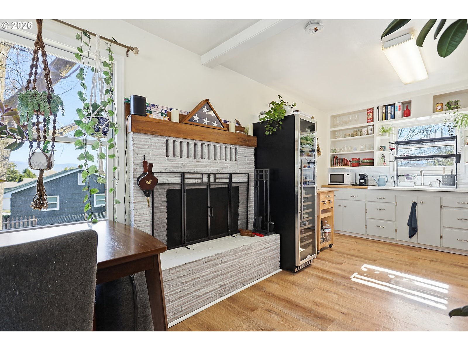 1214 Walnut Street The Dalles, OR 97058 - Photo 5 of 29 a bedroom with a bed and a book shelf