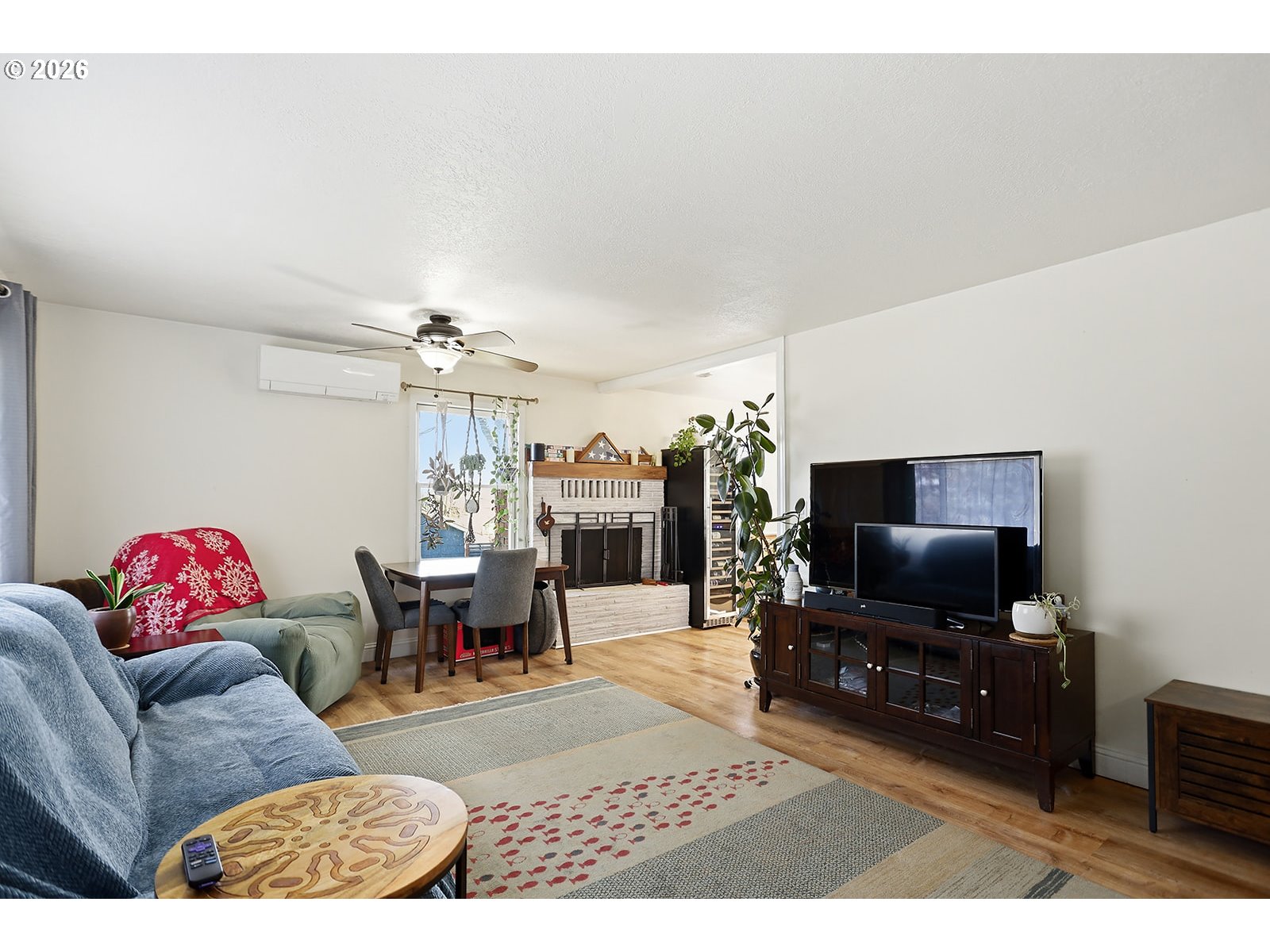 1214 Walnut Street The Dalles, OR 97058 - Photo 7 of 29 a living room with furniture and a flat screen tv