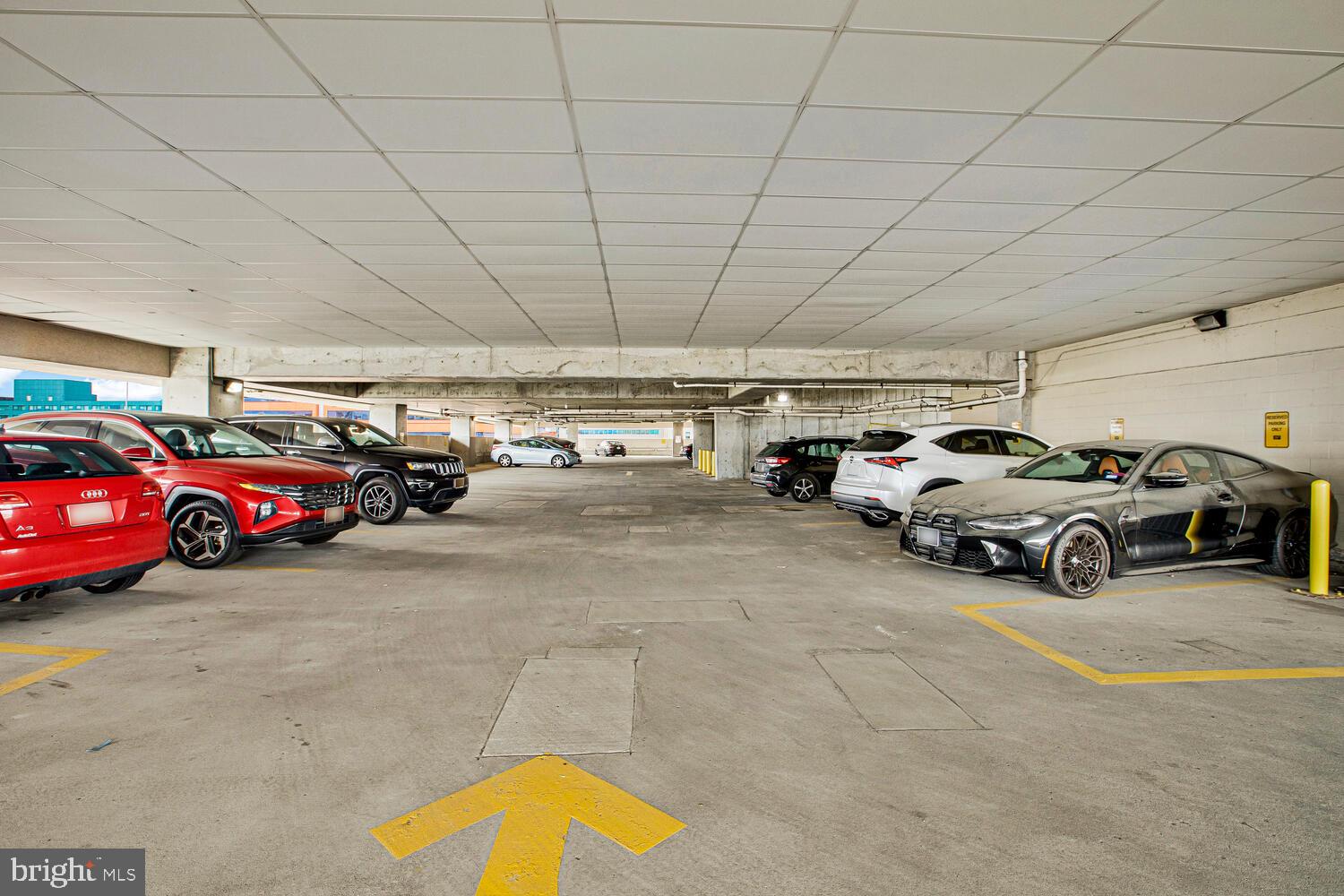 414 Water Street, Unit 2913 Baltimore, MD 21202 - Photo 2 of 41 a view of parking space with parked cars