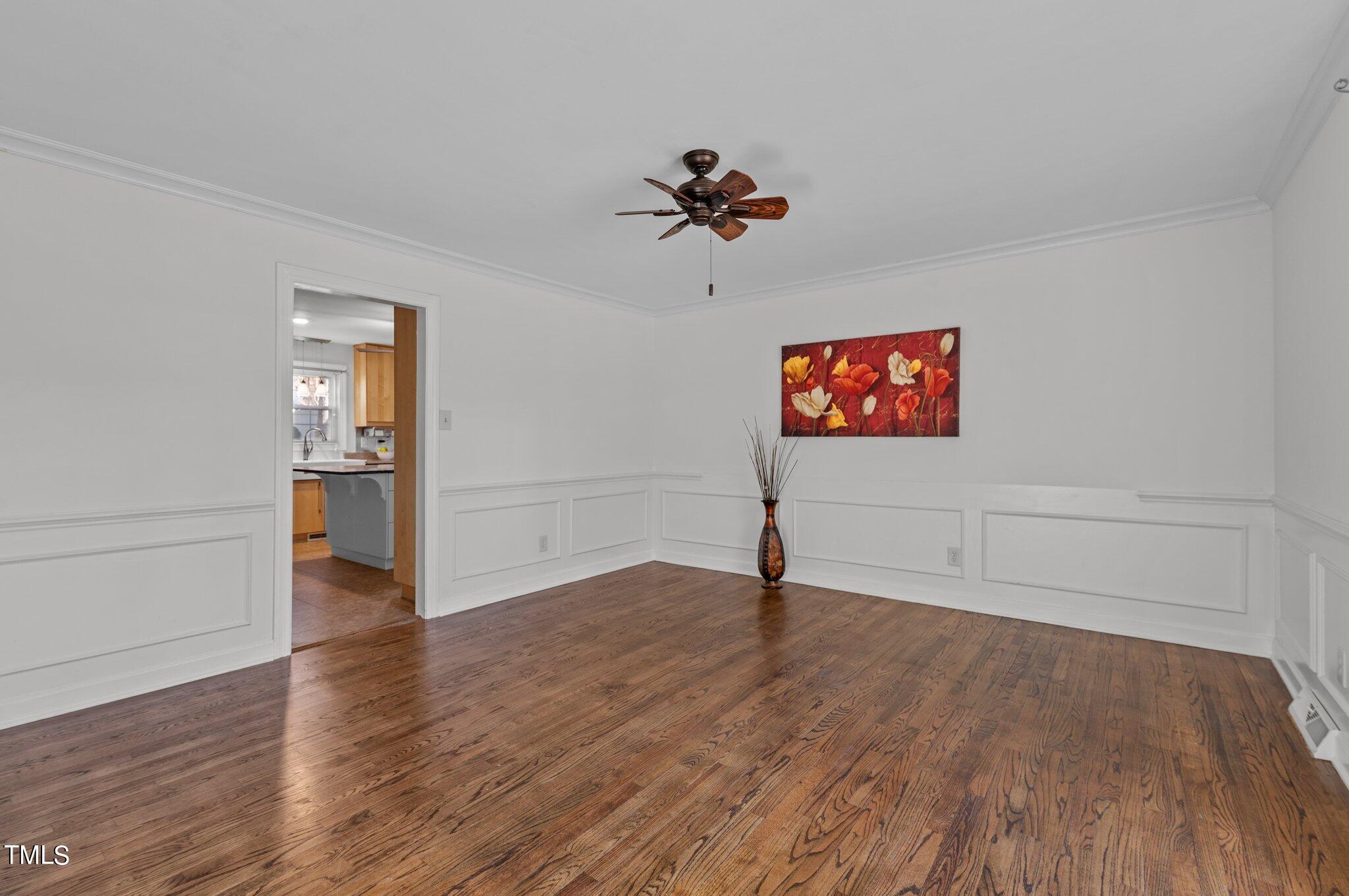 4712 Scollay Court Raleigh, NC 27609 - Photo 5 of 32 Dining Room with Custom Wainscoting