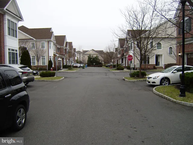 a view of a street with cars