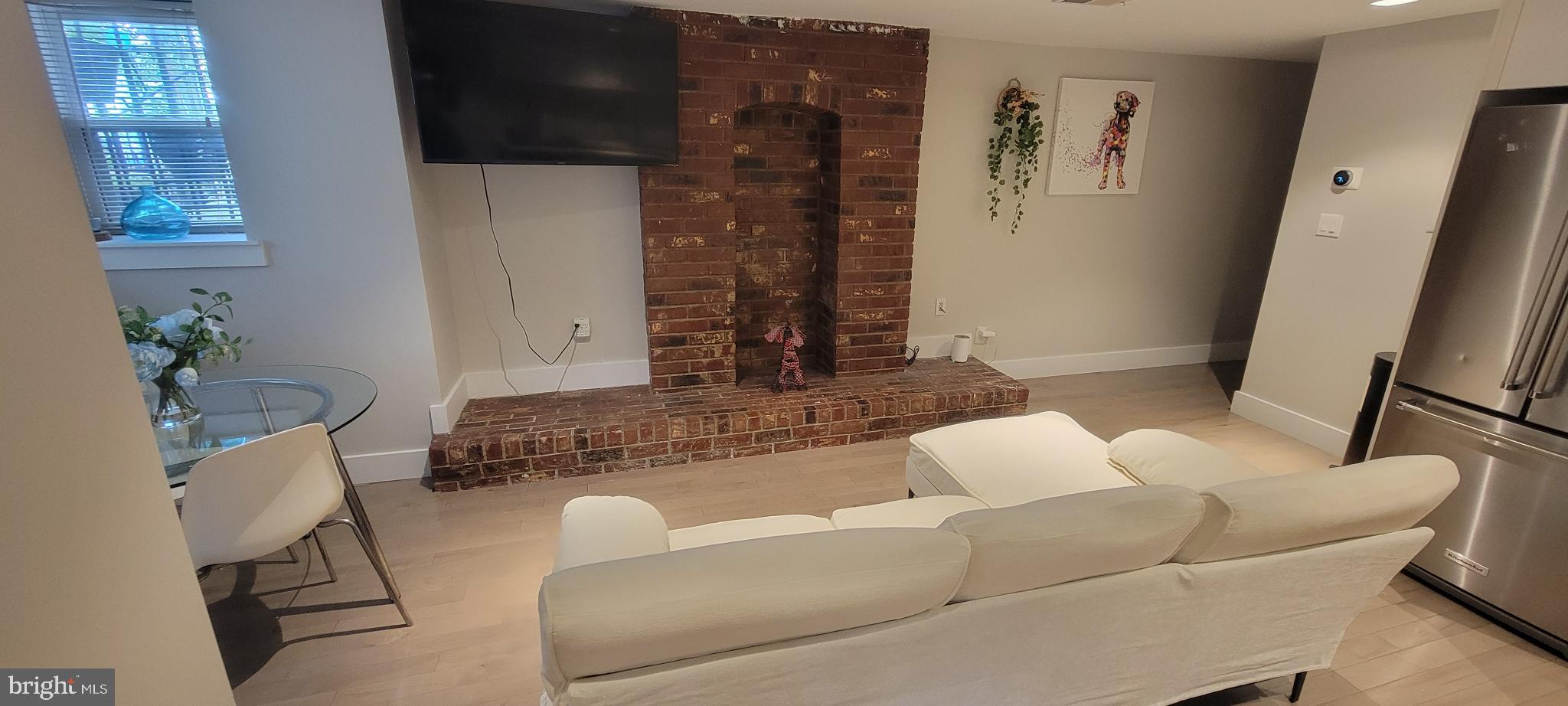 41 Q Street Northwest, Unit B Washington, DC 20001 - Photo 14 of 21 Charming living space with rustic accents.