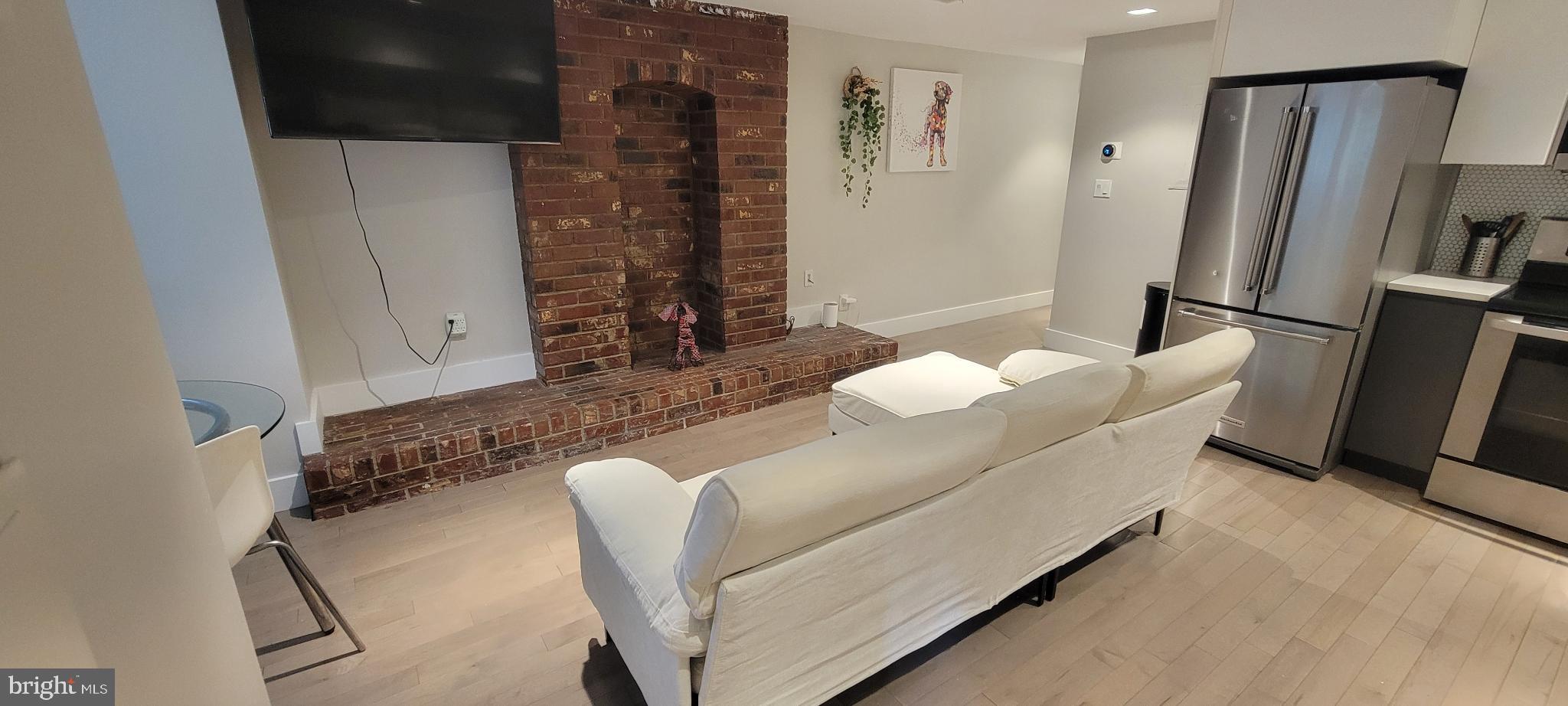 41 Q Street Northwest, Unit B Washington, DC 20001 - Photo 15 of 21 Charming living space with rustic accents.