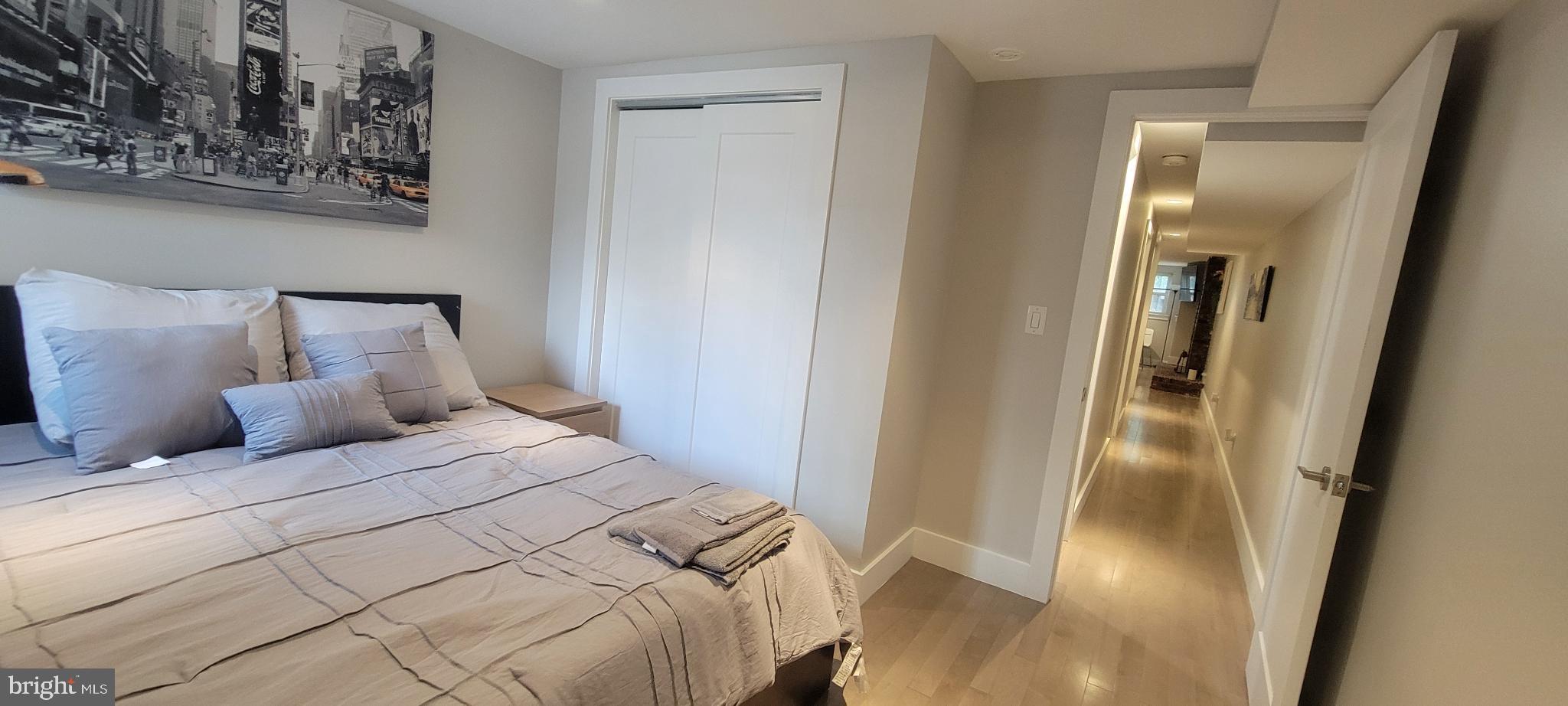 41 Q Street Northwest, Unit B Washington, DC 20001 - Photo 7 of 21 Modern bedroom with sleek design elements.