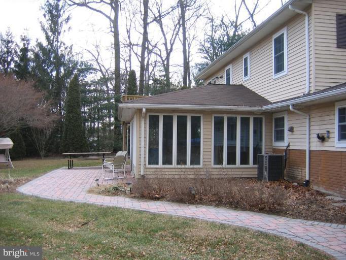 913 Emory Church Road Upperco, MD 21155 - Photo 11 of 30 Indoor pool room with many casement windows.
