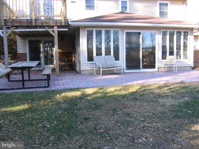 913 Emory Church Road Upperco, MD 21155 - Photo 26 of 30 Spacious Brick Paver Patio, partically covered.