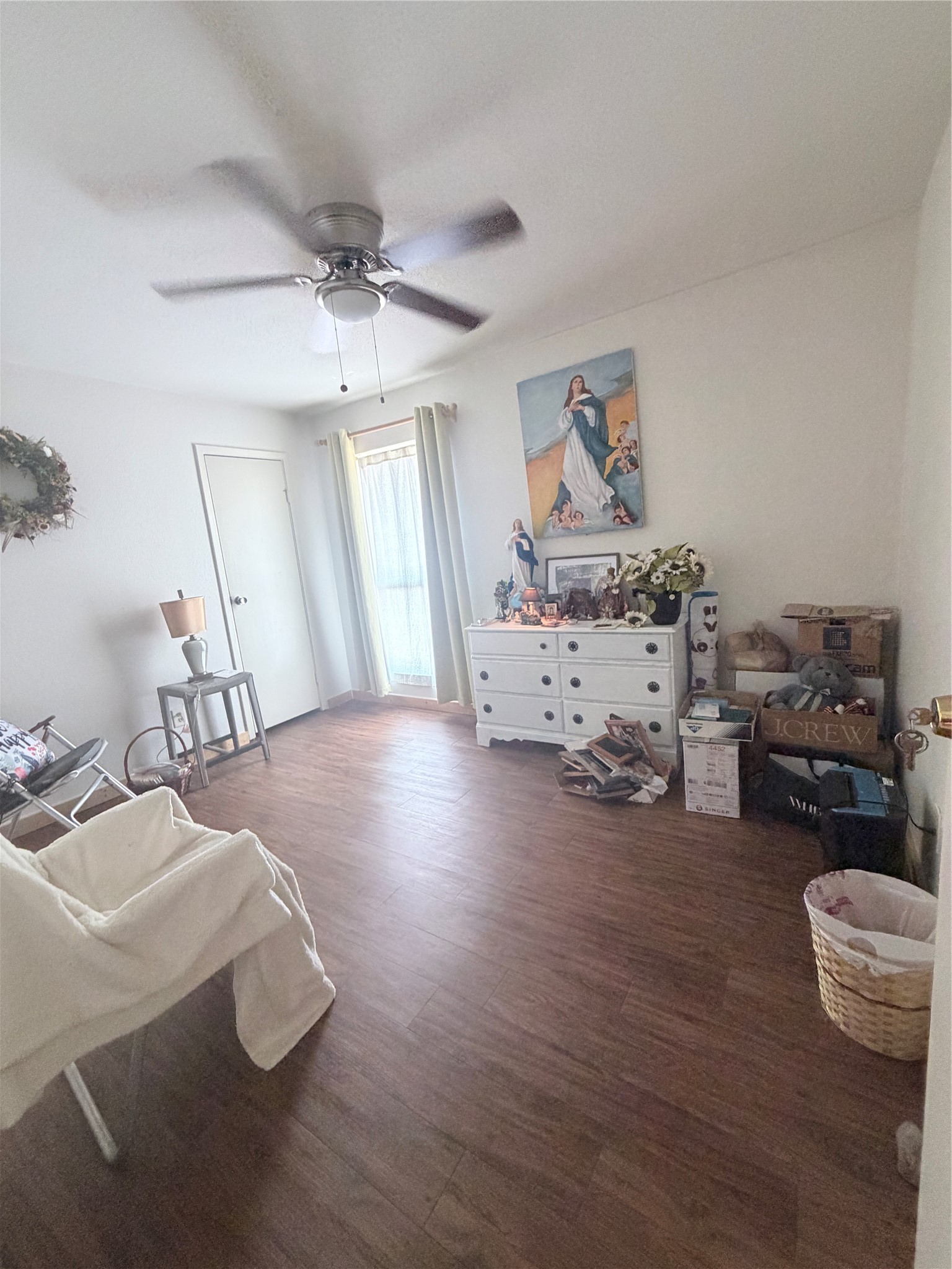 10100 South Gessner Road, Unit 606 Houston, TX 77071 - Photo 6 of 12 a living room with furniture and a wooden floor