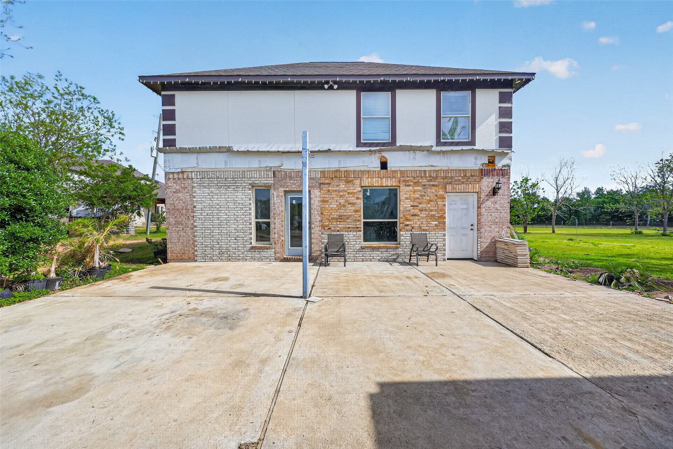8023 Pool Hill Road Fulshear, TX 77441 - Photo 26 of 50 a house view with a outdoor space