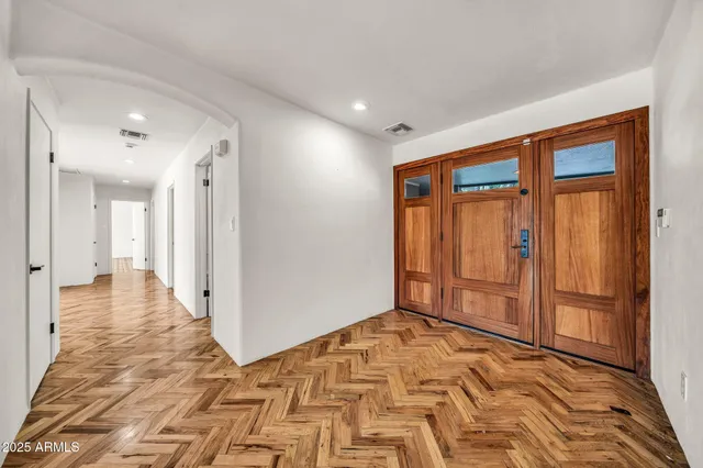 a view of a room with furniture and rug