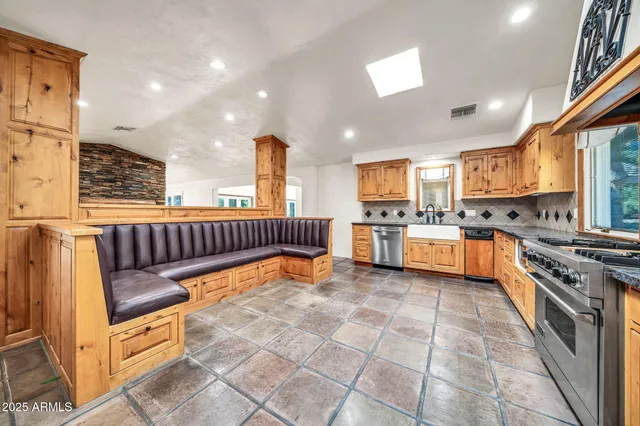 a bathroom with a bathtub and shower