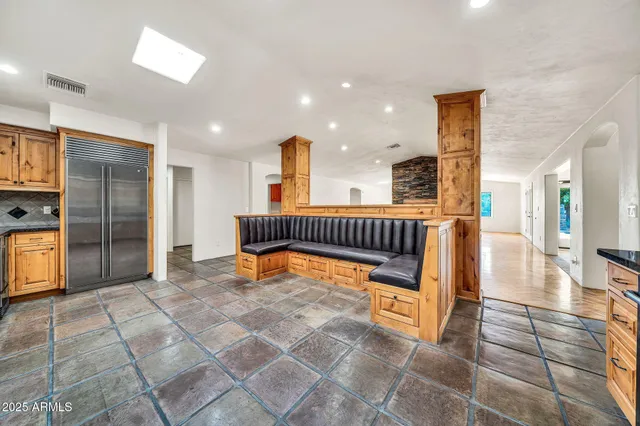 a bathroom with a bathtub and shower