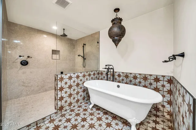 a view of a big room with wooden cabinet and a hallway