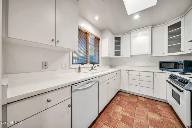 a backyard of a house with large trees