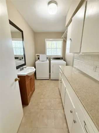 a view of a kitchen with furniture and window