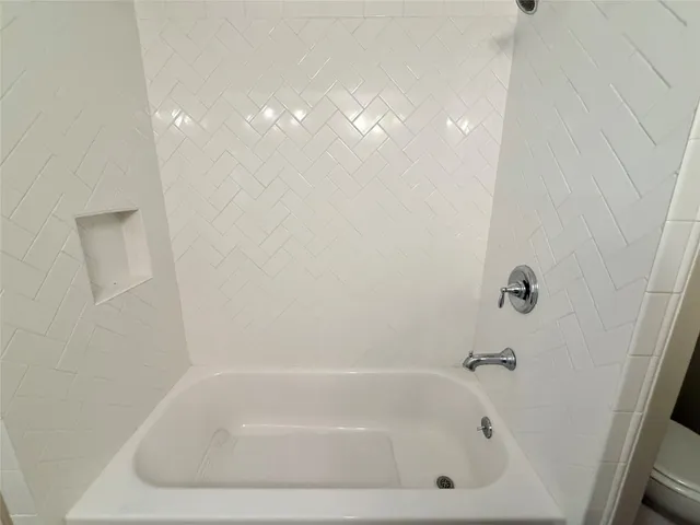a bathroom with a tub