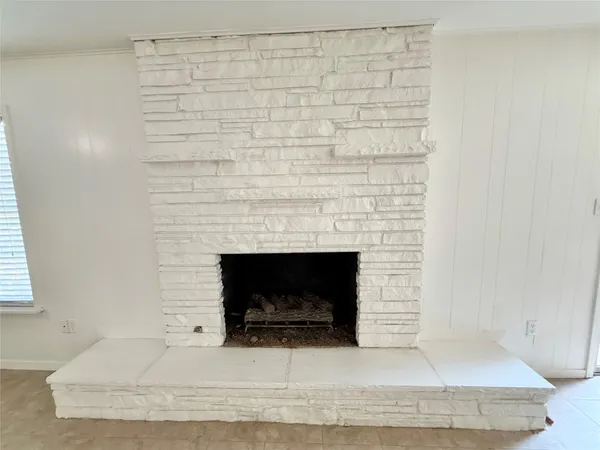 a living room with a fireplace