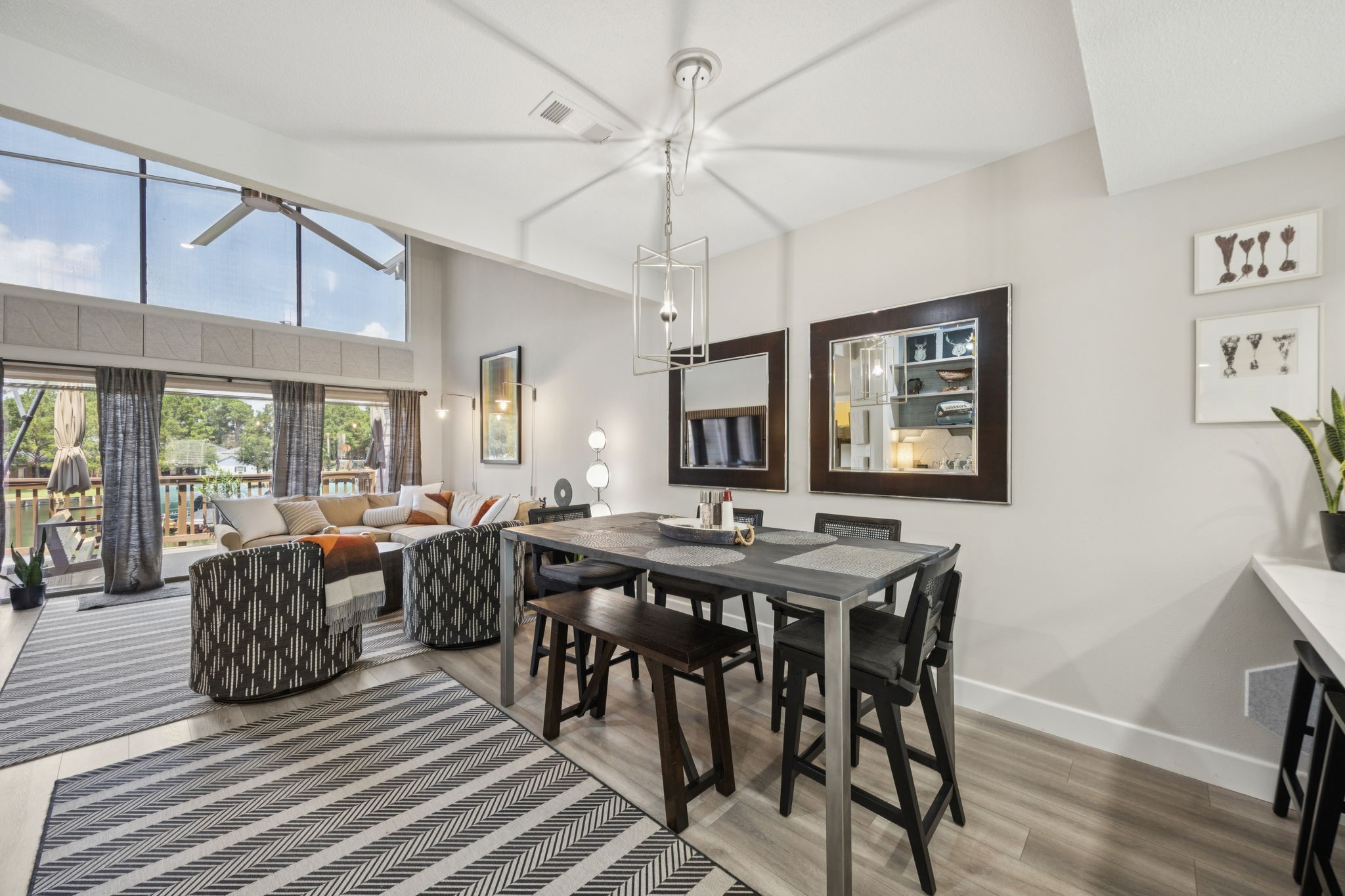 500 River Road, Unit 106 Montgomery, TX 77356 - Photo 8 of 31 a view of a dining room with furniture window and wooden floor