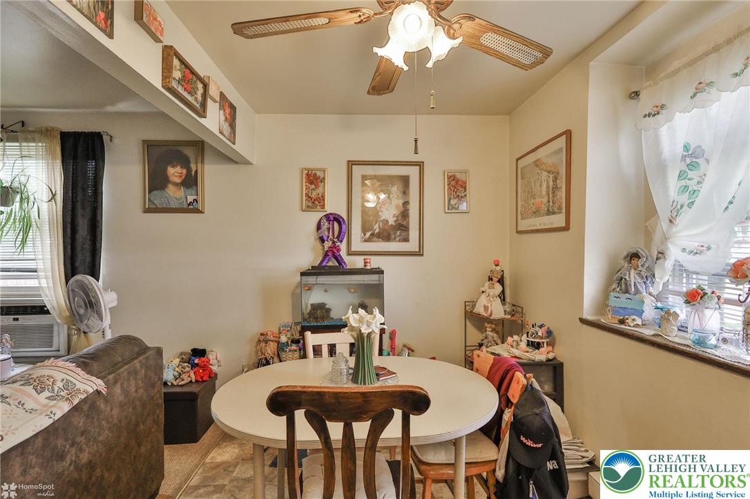 802 West Berwick Street Easton, PA 18042 - Photo 21 of 54 a view of a dining room with furniture and a chandelier