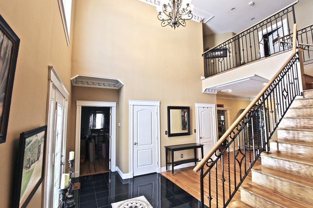70 Summer Street Stoneham, MA 02180 - Photo 13 of 30 a view of front door with stairs