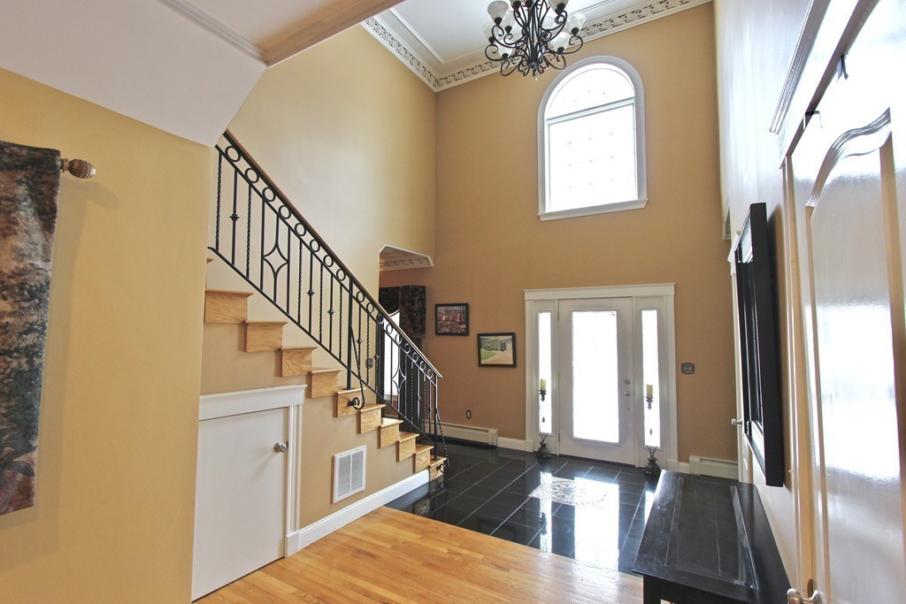 70 Summer Street Stoneham, MA 02180 - Photo 14 of 30 a view of entryway and hall with wooden floor