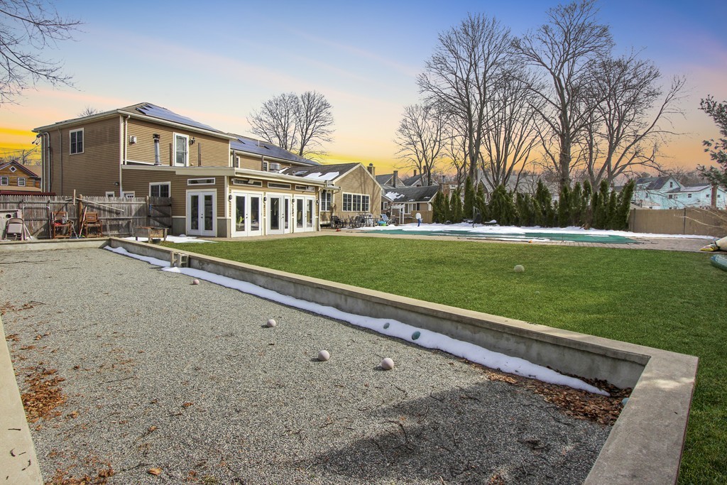 70 Summer Street Stoneham, MA 02180 - Photo 2 of 30 a front view of a house with a yard and trees