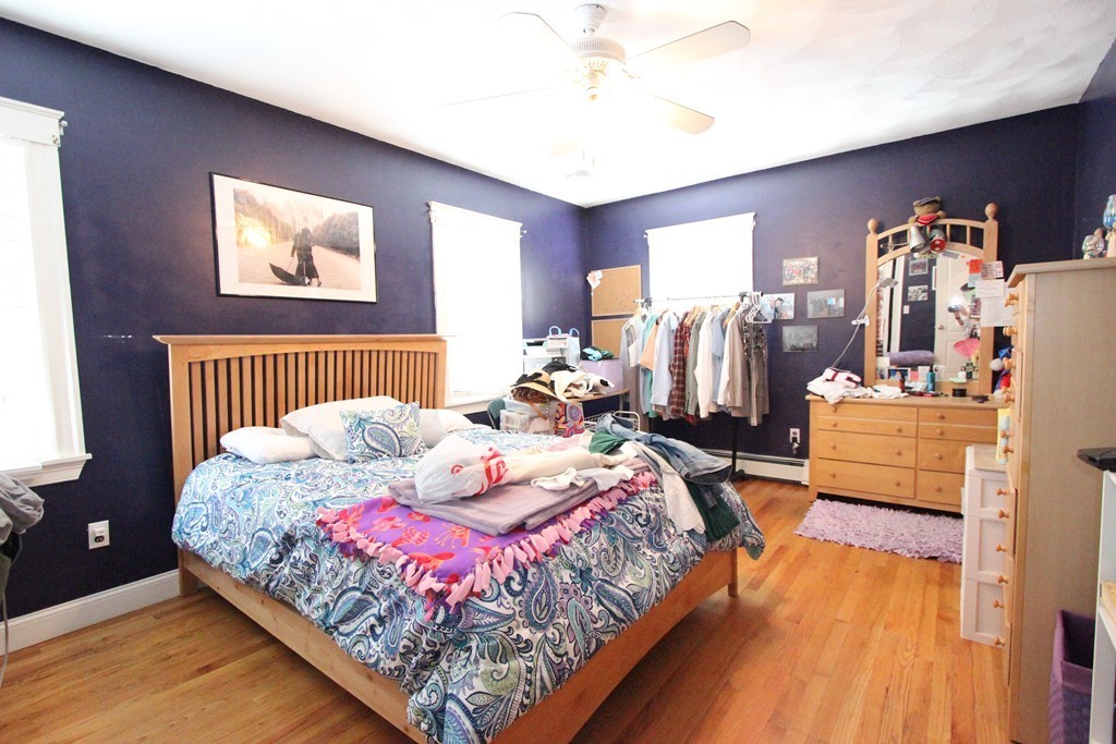 70 Summer Street Stoneham, MA 02180 - Photo 21 of 30 a bedroom with bed and window