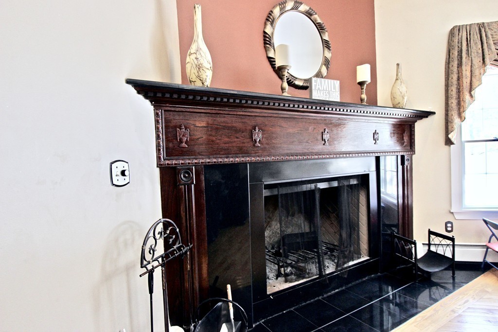 70 Summer Street Stoneham, MA 02180 - Photo 7 of 30 a close view of a fireplace in the room