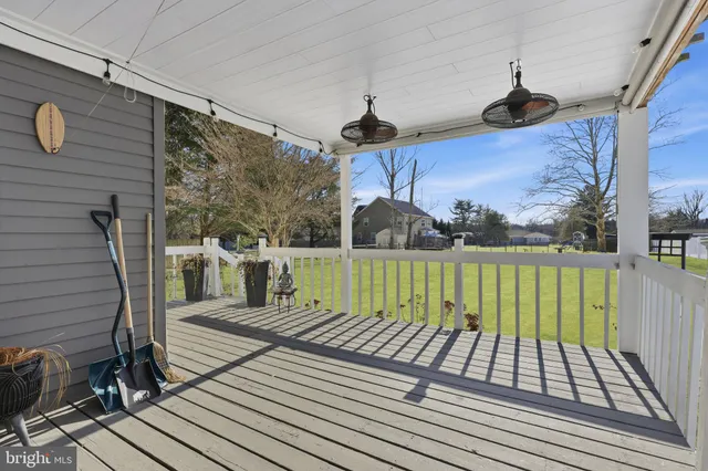 a view of swimming pool with a patio
