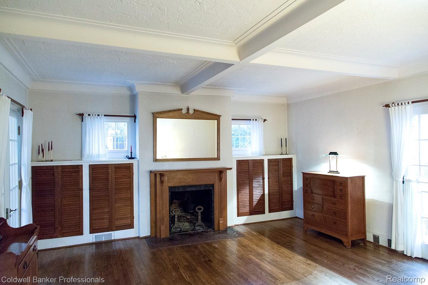 2252 Yorkshire Road Birmingham, MI 48009 - Photo 5 of 34 Living room with coffered ceiling, gleaming floors and natural fireplace