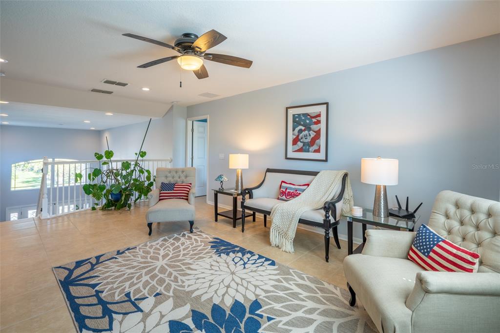 309 Royal Bonnet Drive Apollo Beach, FL 33572 - Photo 22 of 59 a living room with furniture and a potted plant