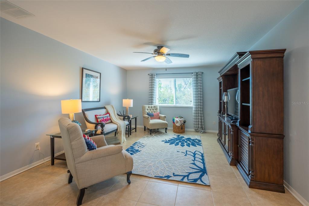 309 Royal Bonnet Drive Apollo Beach, FL 33572 - Photo 23 of 59 a bedroom with furniture and a window
