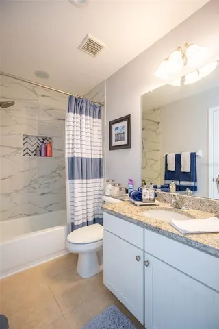 a view of an outside dining space with furniture window