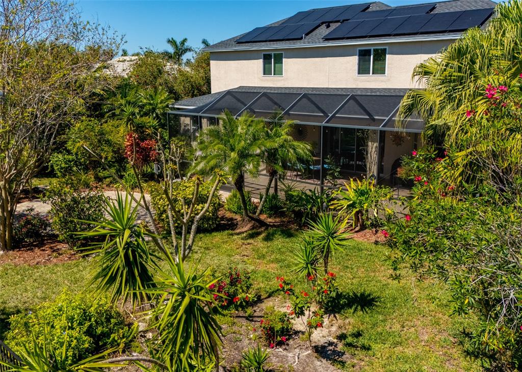 309 Royal Bonnet Drive Apollo Beach, FL 33572 - Photo 46 of 59 a view of a house with a flower garden