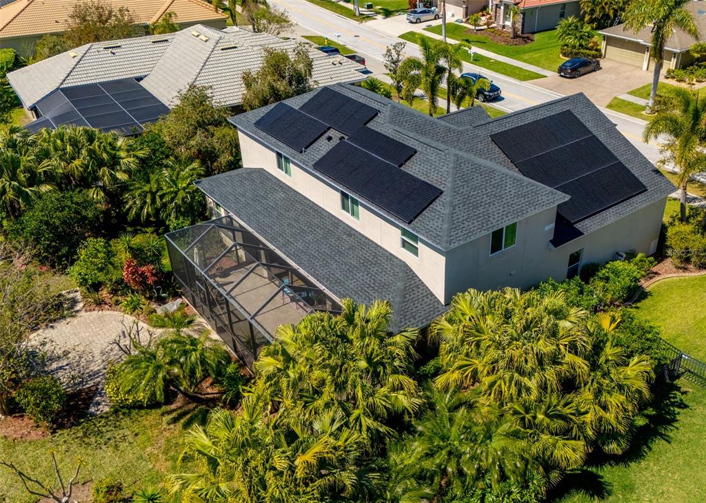 309 Royal Bonnet Drive Apollo Beach, FL 33572 - Photo 51 of 59 an aerial view of a house with a yard and garden
