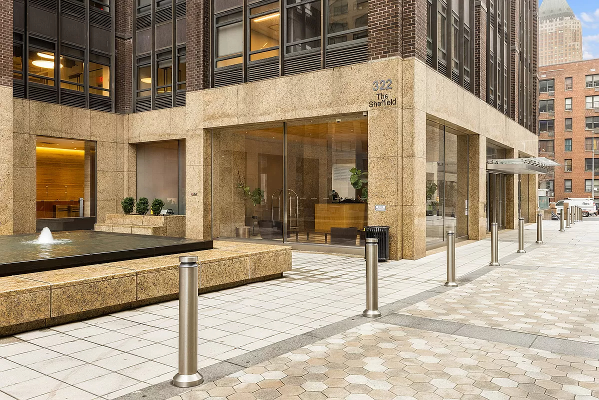 322 West 57th Street, Unit 25H Manhattan, NY 10019 - Photo 8 of 9 a view of a building with sitting area