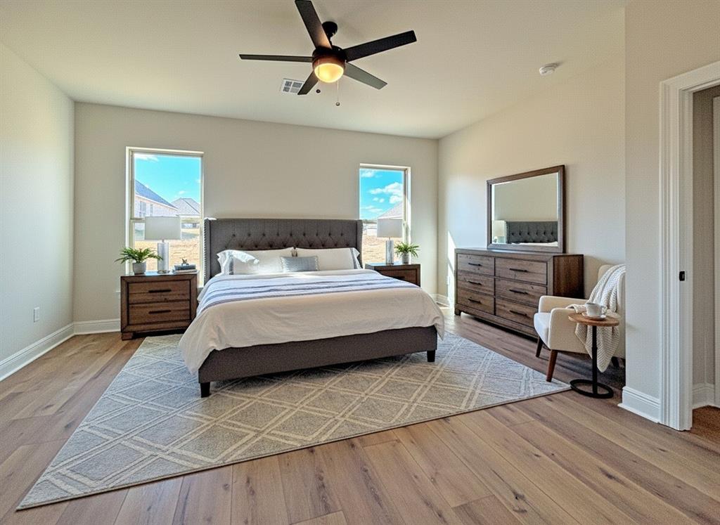 406 Hummingbird Lane Princeton, LA 71067 - Photo 18 of 25 a bedroom with a bed and furniture