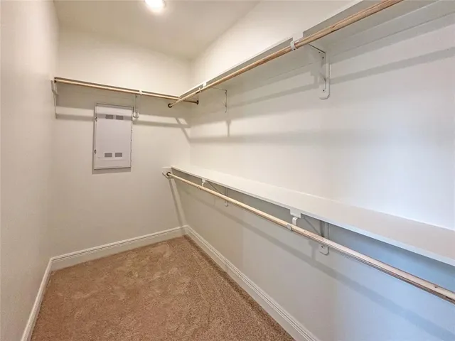 a view of a room with racks on the wall