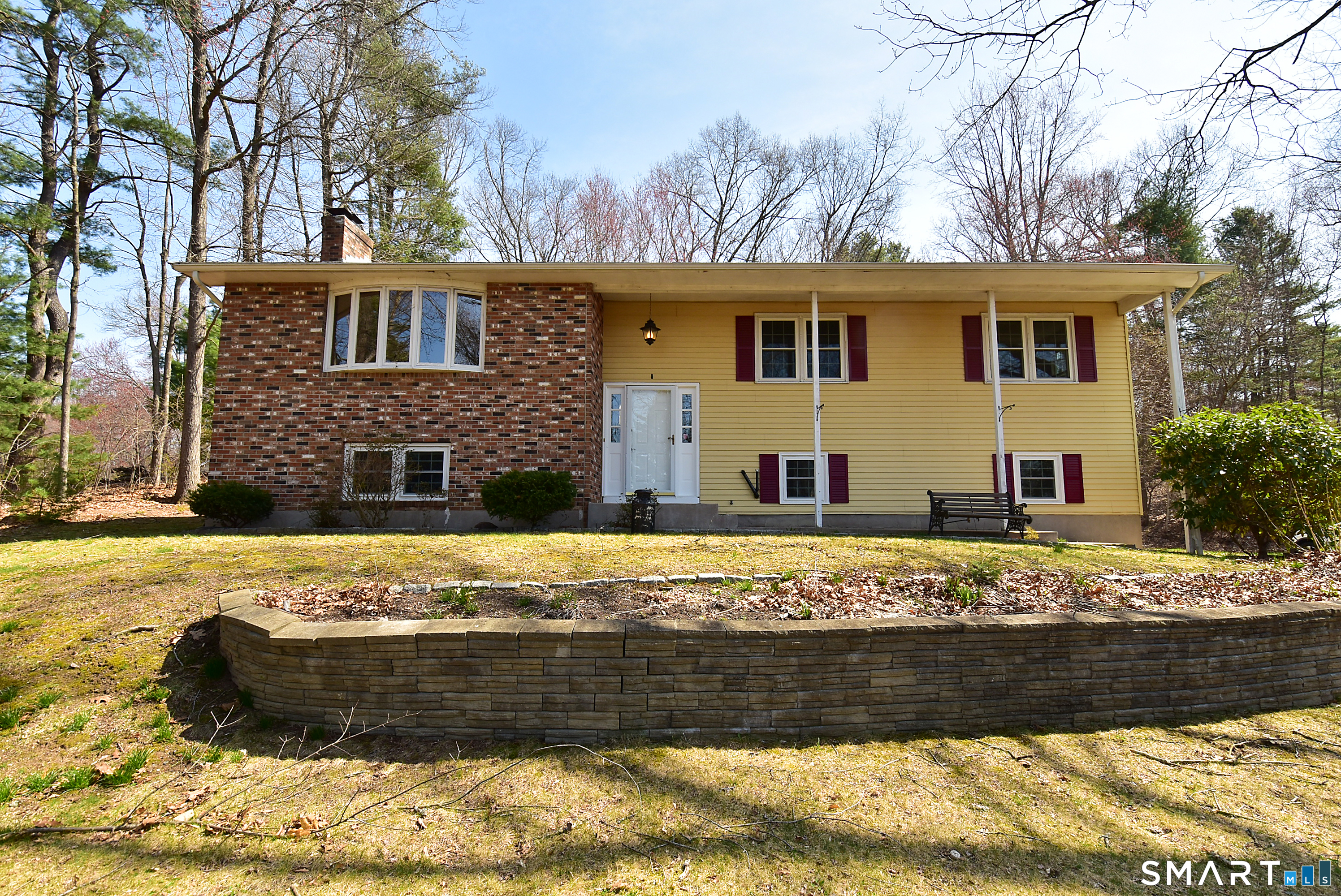 45 Grissom Road Manchester, CT 06042 - Photo 1 of 1 a front view of a house with a yard