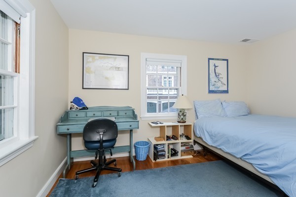 354 Woodland Road Brookline, MA 02467 - Photo 23 of 30 a bedroom with furniture and a window