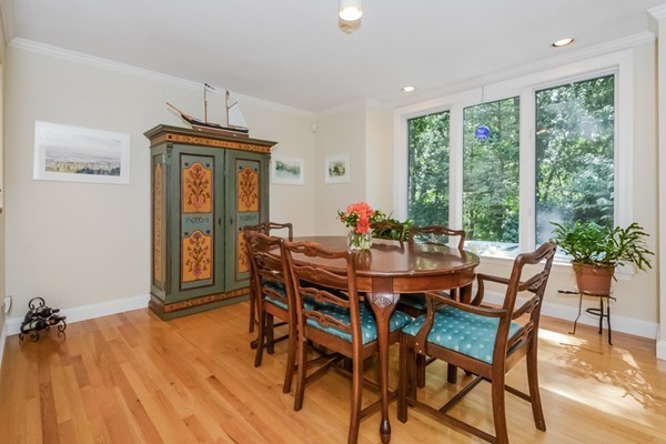 354 Woodland Road Brookline, MA 02467 - Photo 9 of 30 a view of a dining room with furniture window and outside view