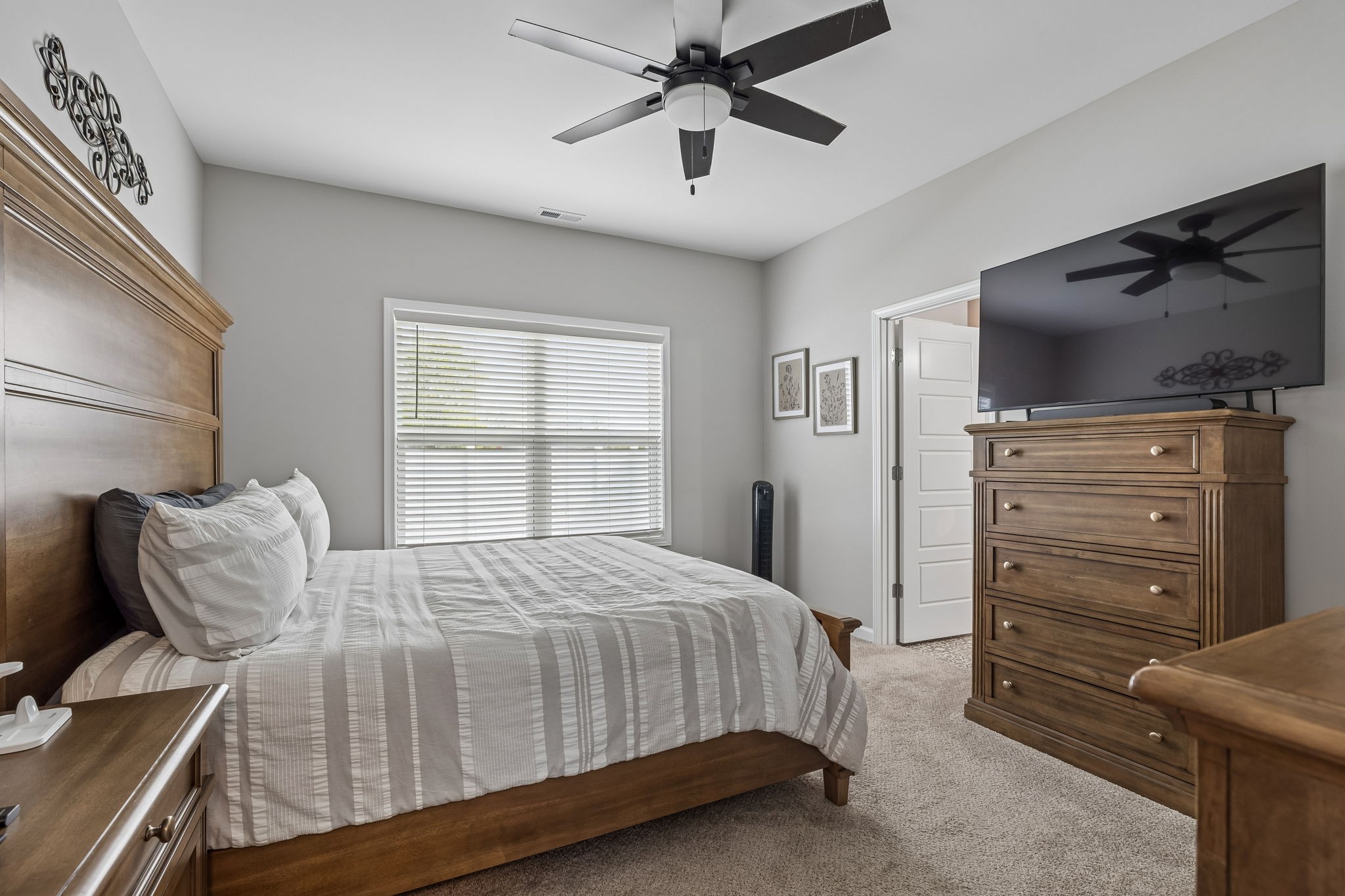 180 Vickers Hill Road Smithville, TN 37166 - Photo 18 of 33 a bedroom with a bed and a window