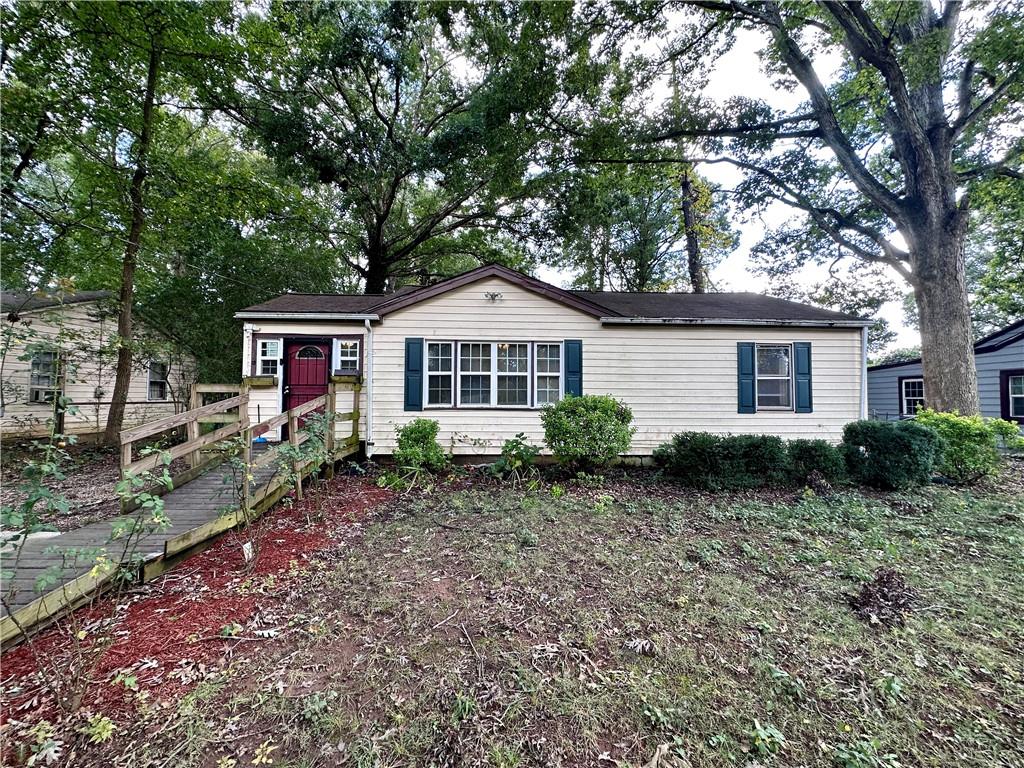 4189 Lindsey Drive Decatur, GA 30035 - Photo 1 of 1 a front view of a house with garden